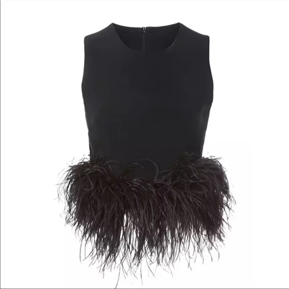 This beautiful evening Top. I only have 1 in L, if you are a M you can wear it